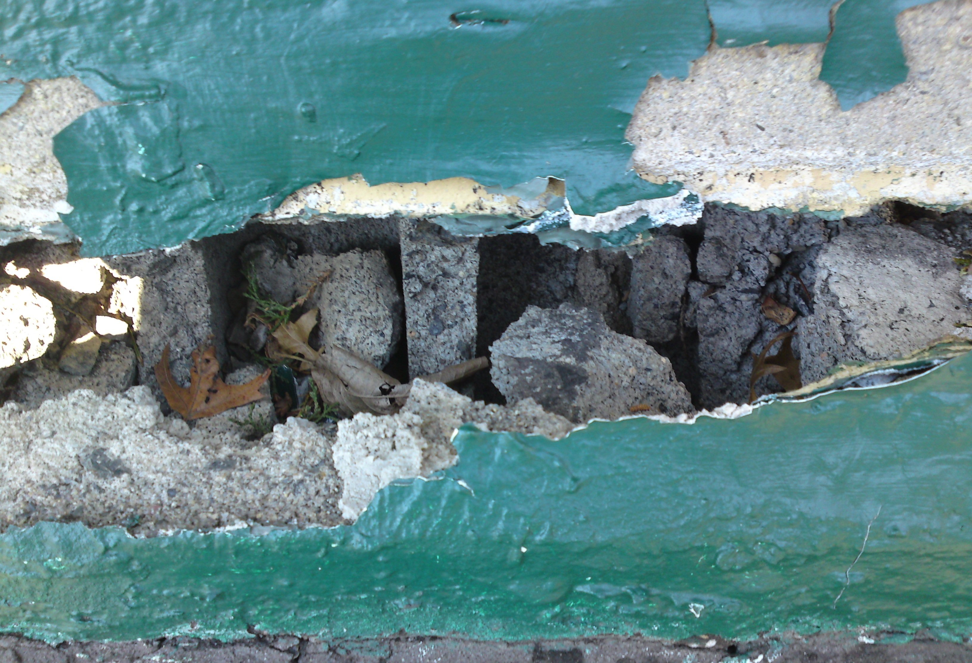 Image for How to repair Cinder Block Long driveway wall that has a break in it