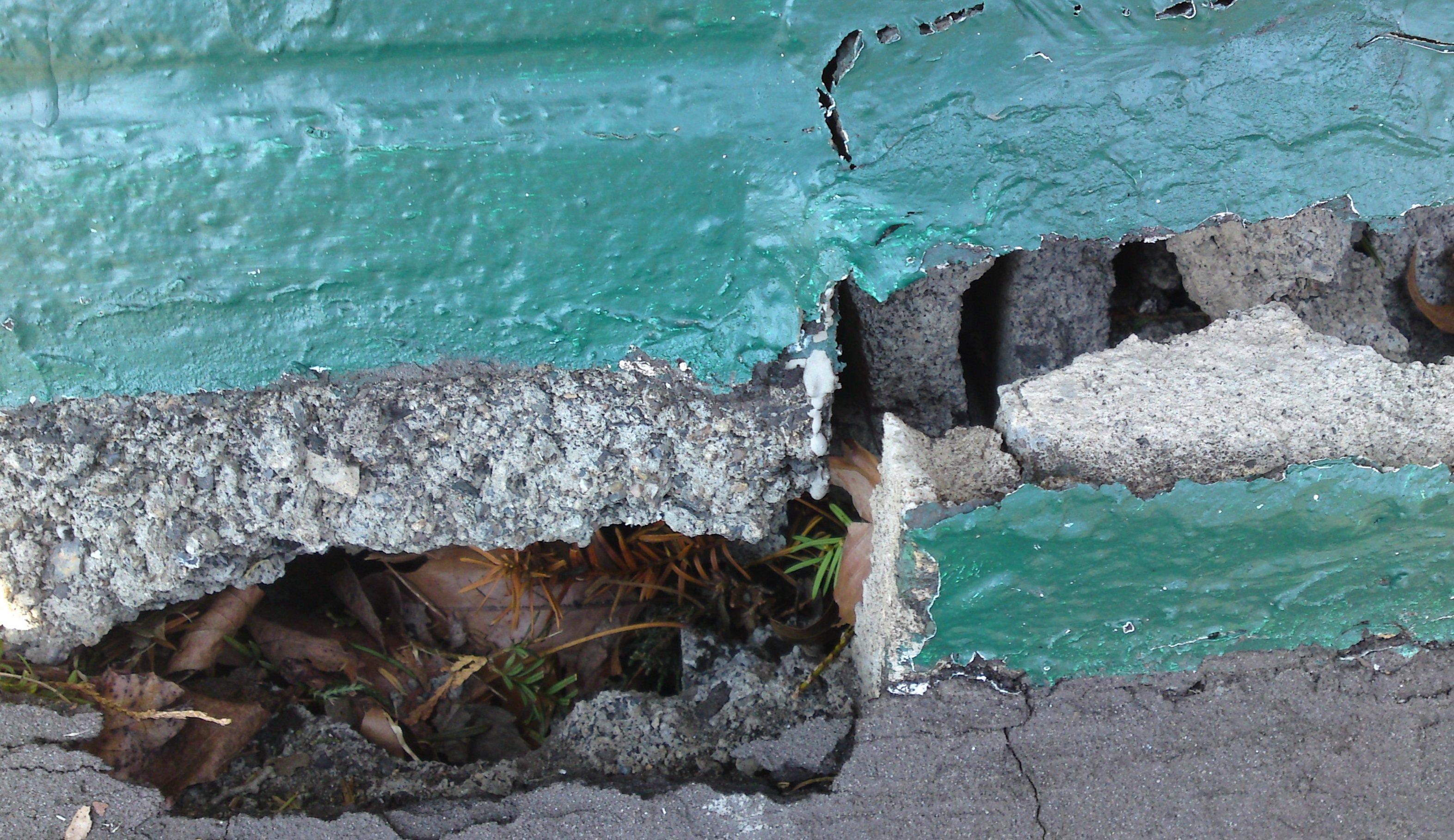 Image for How to repair Cinder Block Long driveway wall that has a break in it