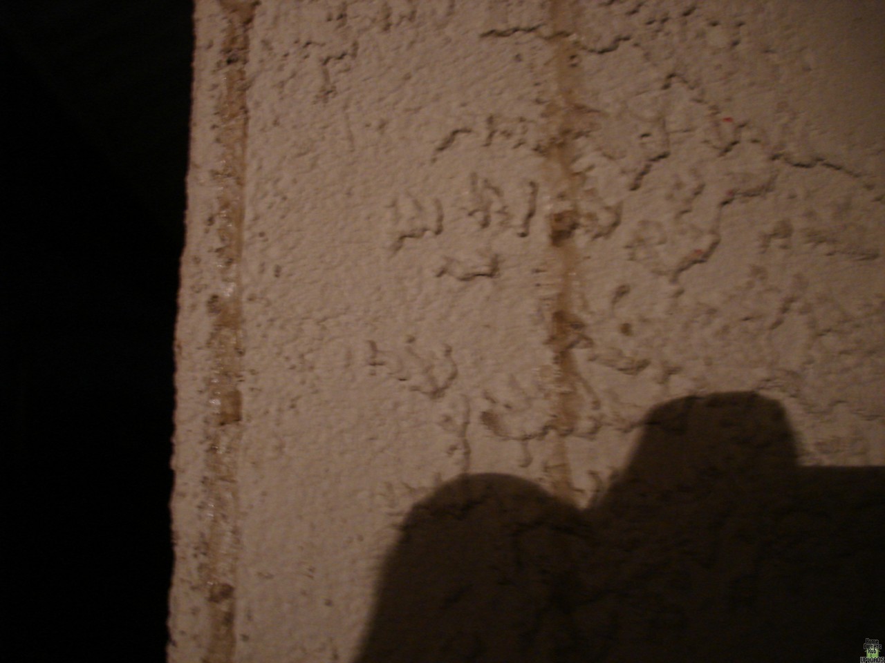 Image for How do I remove industrail glue from exterior stucco wall?