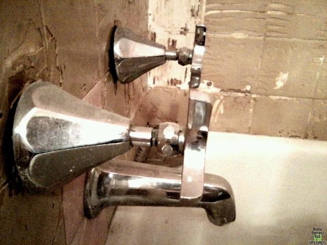 Image for How do I remove old Kohler bathtub faucet handles to install a tub surround.