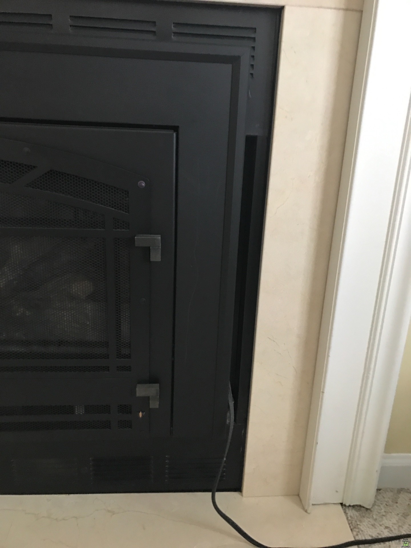 Image for New propane fireplace insert doesn't fit existing space