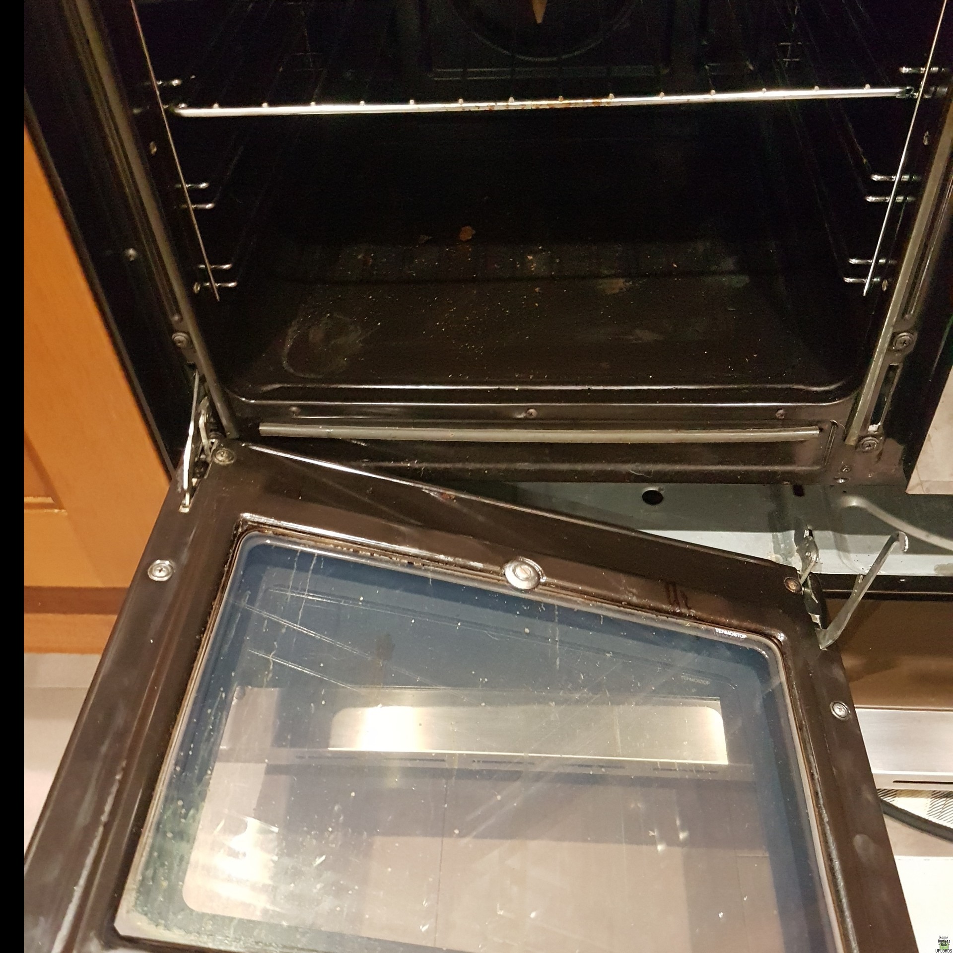 Image for Oven door stuck on one side 