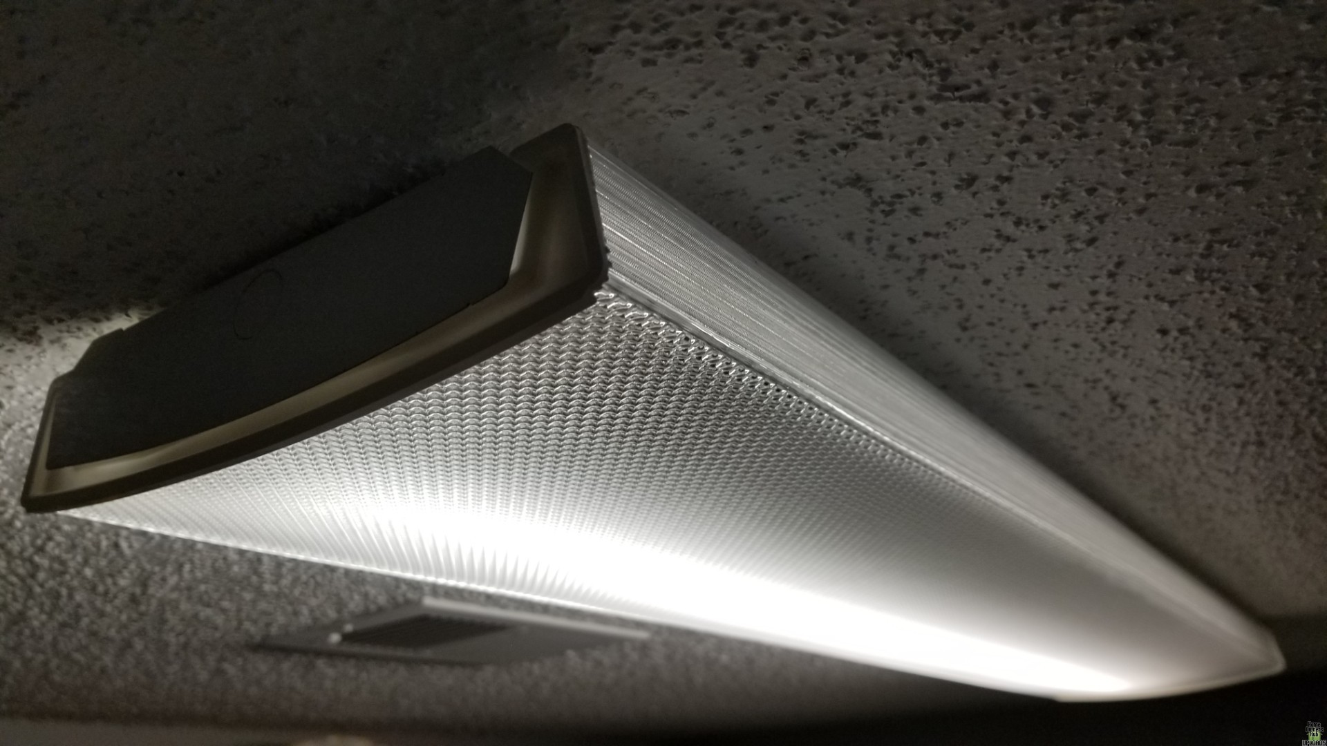 Image for removing acrylic cover from kitchen light