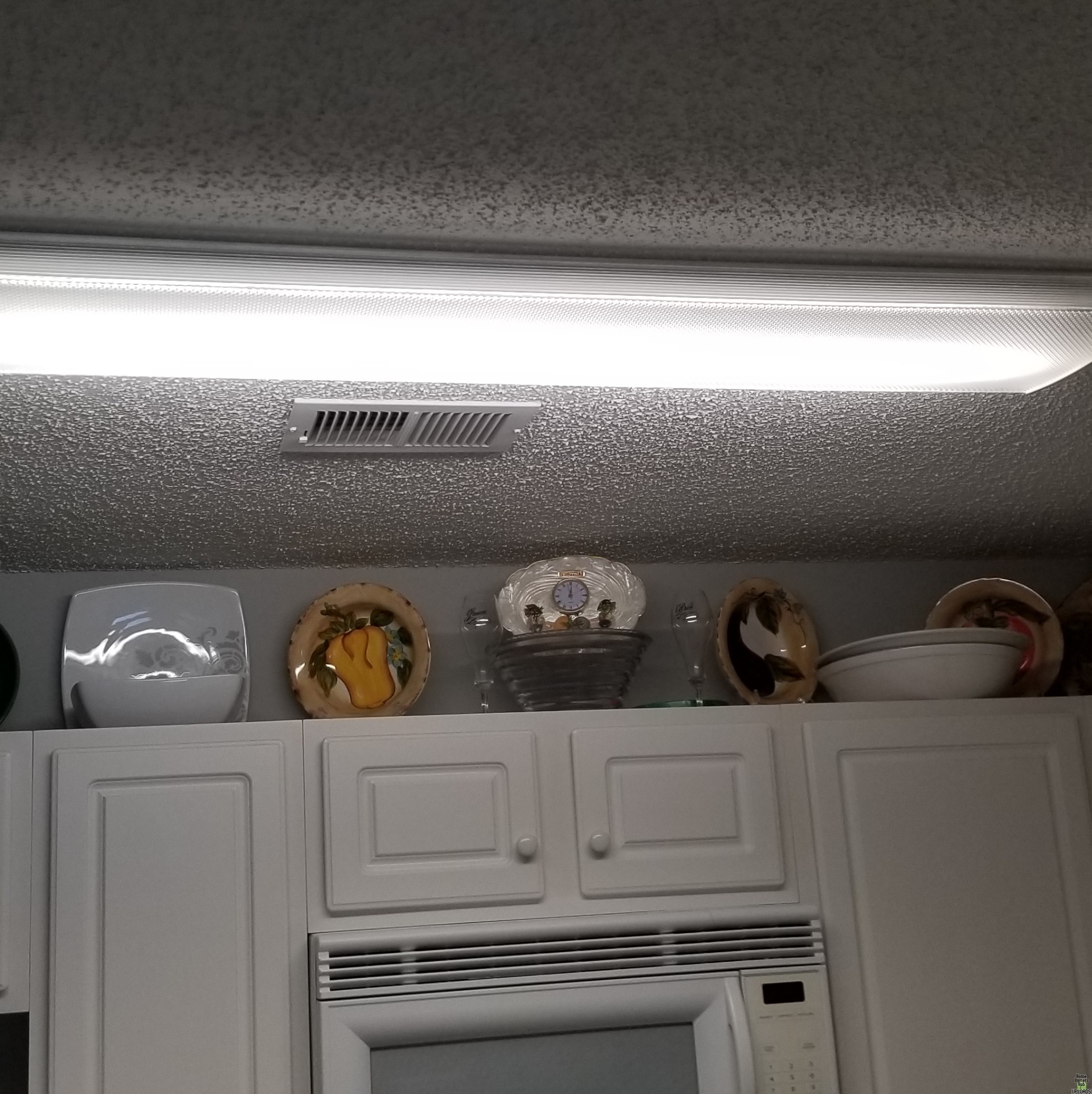 Image for removing acrylic cover from kitchen light