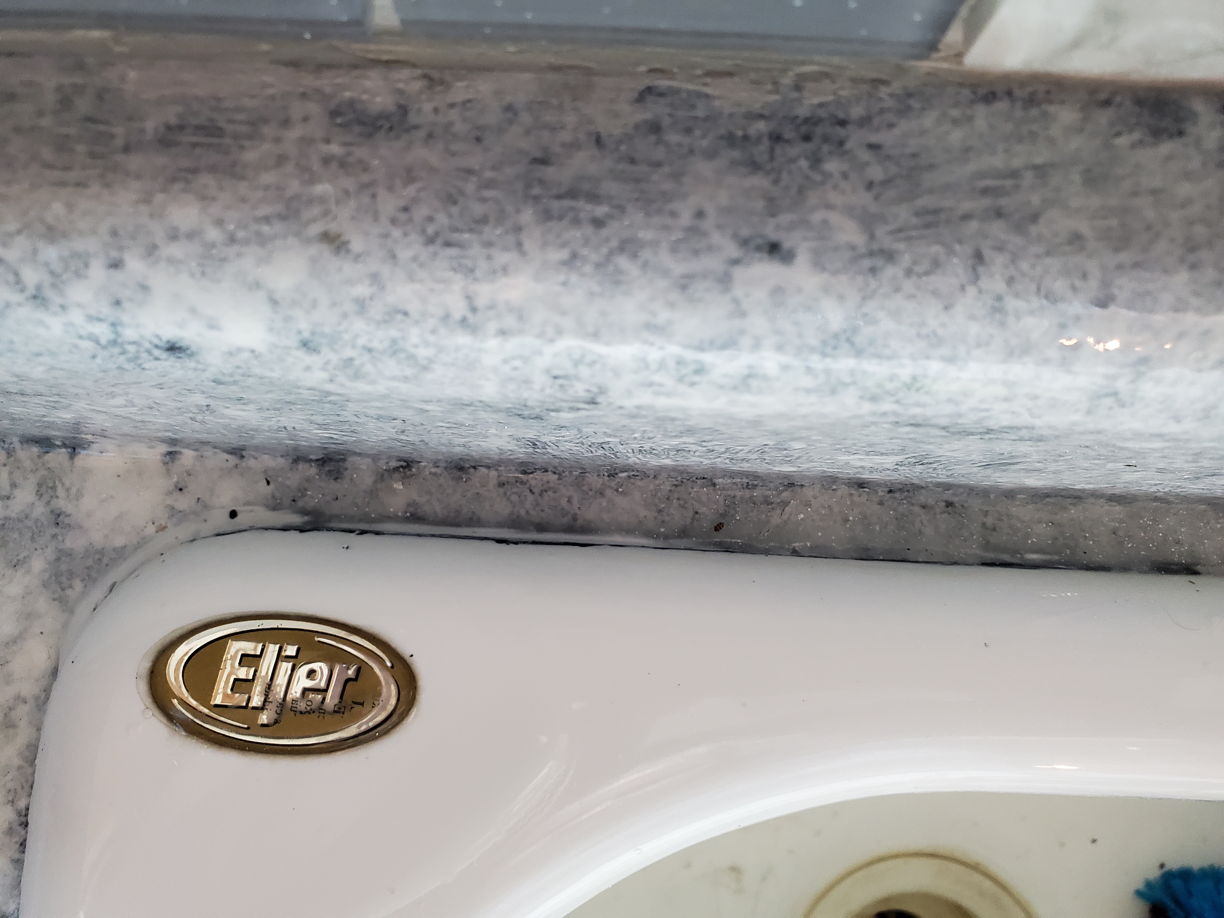 Image for How to get rid of gap from sink edge to backsplash