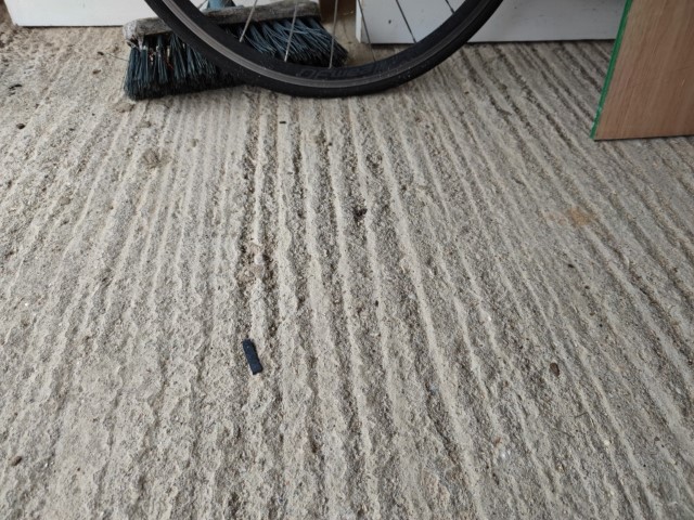 Image for To self-level or not garage concrete floor with "grooves/waves" to convert to home office