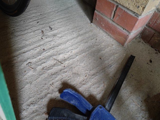 Image for To self-level or not garage concrete floor with "grooves/waves" to convert to home office