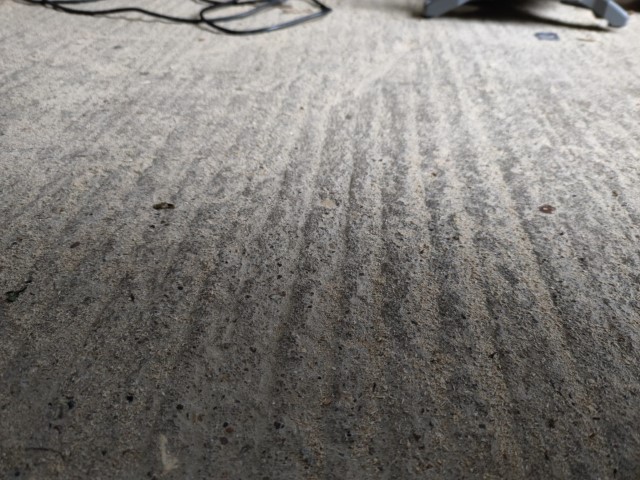 Image for To self-level or not garage concrete floor with "grooves/waves" to convert to home office