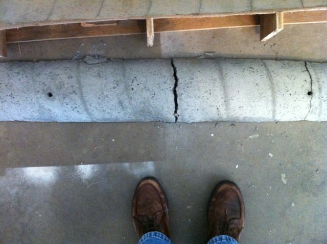 Image for how to build concrete berm (think speed bump only smaller)